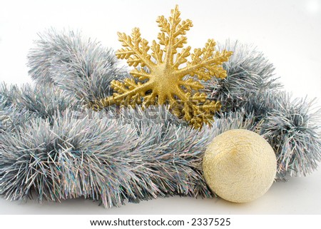 silver christmas decoration with gold snowflake