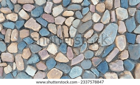 Stone texture for the background. Multicolored stone pavement