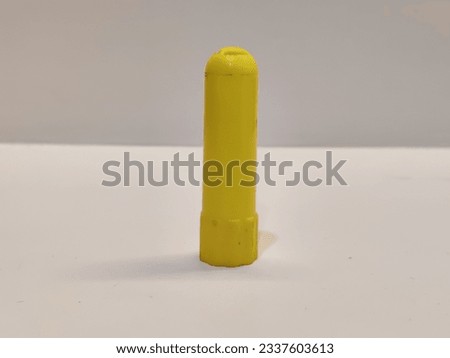 Yellow colour toy object isolated on white background