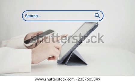 Female hand pointing at tablet screen internet job submission search website icon