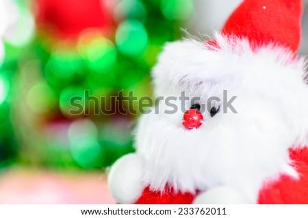 Close up Santa doll with bokeh background, dept of field.
