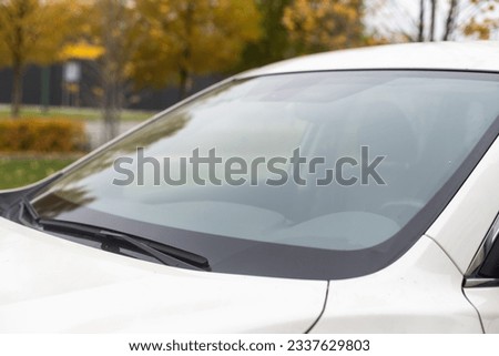car's windshield rain wiper. window