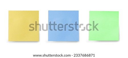 three blank sticky notes isolated on white background. Discussing business, teamwork, brainstorming concept. Set of multicolored sticky notes paper copy space collection isolated on white Royalty-Free Stock Photo #2337686871