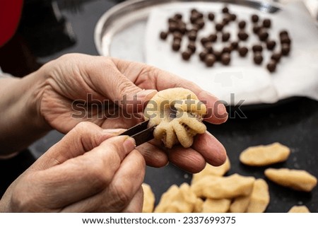 making maamoul for islamic eid Royalty-Free Stock Photo #2337699375