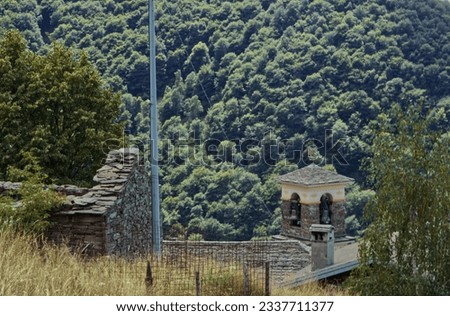 The bell tower of the church of Monteviasco a small isolated village in the mountains of the province of Varese in Lombardy,Italy.