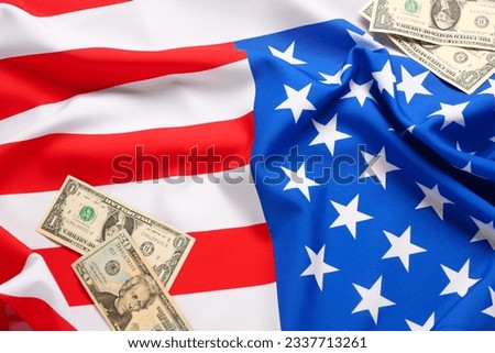 Flag of USA and dollar banknotes