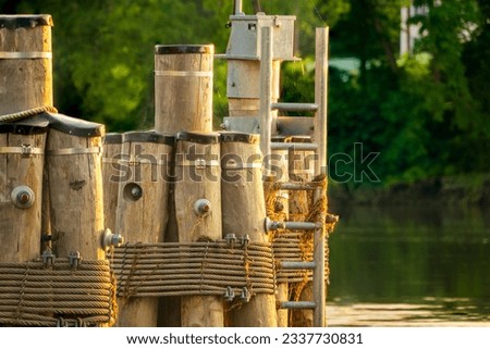 Lashed Pilings on flooded River. High quality photo