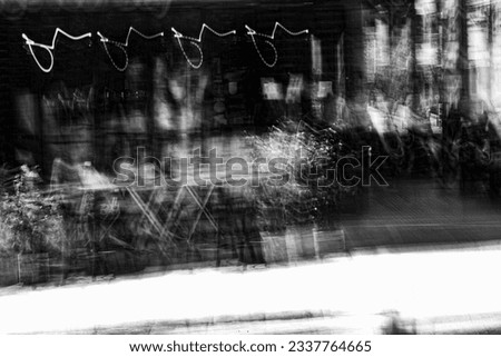 Abstract photography. Deliberately shaken, out of focus, blurred, inconsistently exposed. Creative digitally processed street photography.