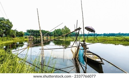 Pictures of fishing with nets in rural areas of Bangladesh. This fishing net is called Vesal net in Bangladesh.