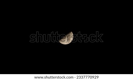 Half moon at the night sky