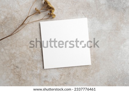 Blank square wish card mockup with botanical decor, top view with copy space