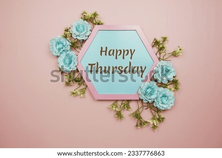 Happy Thursday typography text decorate with flower on pink background