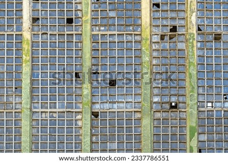 Windows Glass Wall at Abandon Factory Building Exterior Royalty-Free Stock Photo #2337786551
