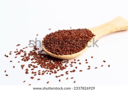 Garden cress seeds (Lepidium sativum L.) in wooden spoon isolated on white background. Royalty-Free Stock Photo #2337826929