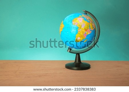 World globe on green background. Copy space.Earth day or environment conservation concept. Save green planet concept