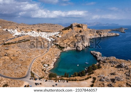 Aerial view on St. Paul's bay in Lindos, Rhodes island, Greece. Panoramic shot overlooking St Pauls Bay at Lindos on the Island of Rhodes, Greece, Europe. Royalty-Free Stock Photo #2337846057