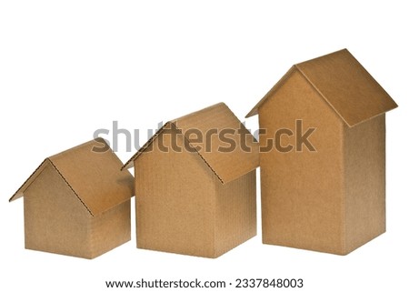 Conceptual cityscape with cardboard buildings on white - concept image