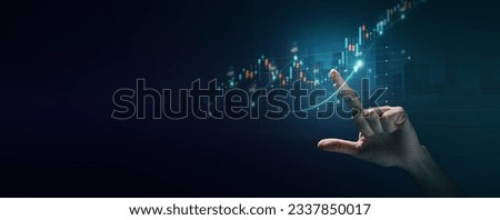 Stock graph and financial chart. Analyze stock market finance volume of stock market with Graph and chart holograph technology. High quality photo Royalty-Free Stock Photo #2337850017