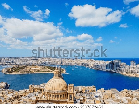 Aero Photography. View from a flying drone. Aerial view of Lady of Mount Carmel church, St.Paul's Cathedral in Valletta. Malta. Top View.