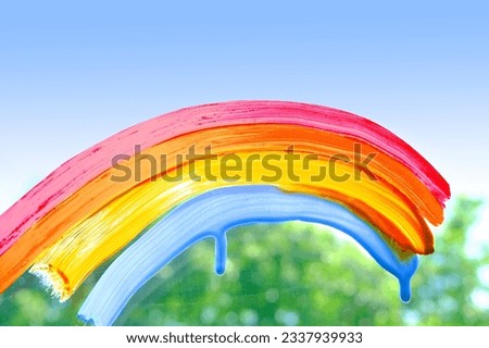 painting rainbow on glass, rain outside window, paints symbol many meanings, gouache, acrylic, creative development, texture background with water drops, place for text, blurry banner, happy childhood