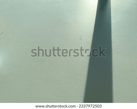 Light and shadow reflect through glass, shadow, sunlight, sunshade, surface.