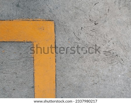 Cement floor background with thicken yellow line, Road Sign.