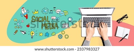 Social media with person using a laptop computer