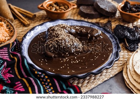 mole poblano is sauce with chicken mexican traditional food in Mexico Latin America Royalty-Free Stock Photo #2337988227