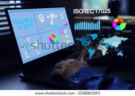 Staff typing with laptop in office to laboratory test report issue under ISO IEC 17025 standard to submit document quality certification mark and staff competency testing and calibration yearly audit Royalty-Free Stock Photo #2338005093