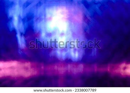 Blue light and purple light on glass window with square pattern, abstract background, design for backdrop or invitation card.