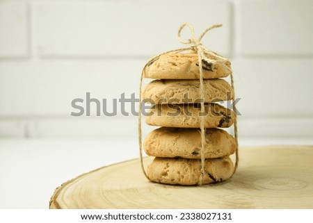 Homemade cookies with pieces of chocolate. Delicious chocolate cookies, round in shape. Copy space. Background with place for text
