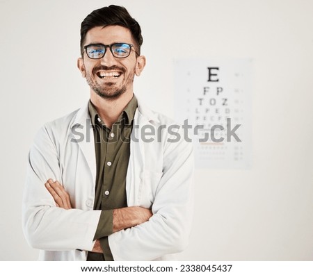 Eye exam, arms crossed and portrait of man optometrist with smile, confidence and friendly service in consultation office. Ophthalmology, face and happy male eye expert proud of vision testing career Royalty-Free Stock Photo #2338045437