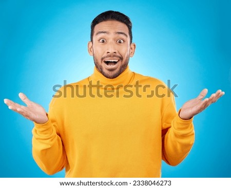 Wow, portrait and asian man in studio with hands for choice, decision or questions on blue background. Palm, scale and face of male customer confused, asking or why emoji for choosing, option or deal Royalty-Free Stock Photo #2338046273