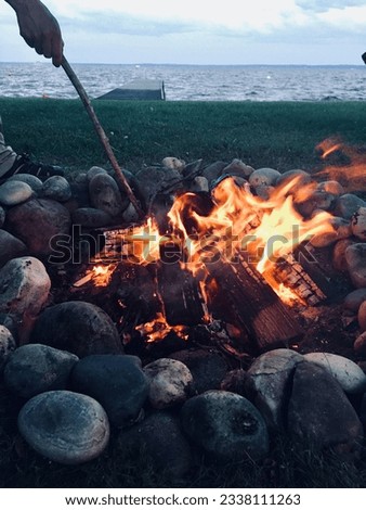 Fire pit on lake front.