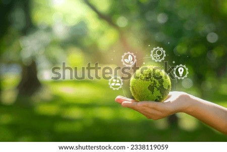 hand holding green earth Contains icons related to business, environment, circular economy concepts, production, waste, consumers, resources, life cycle assessment, LCA, sustainability. Royalty-Free Stock Photo #2338119059