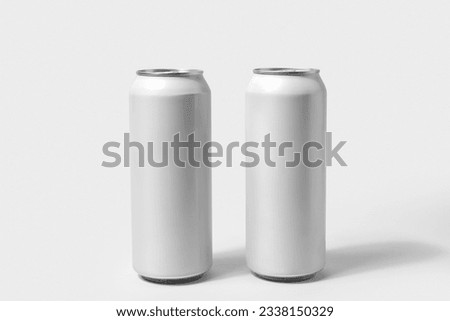 Cans of fresh soda on white background