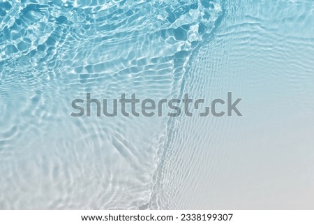abstract blue white water wave, pure natural swirl pattern texture, background photography Royalty-Free Stock Photo #2338199307