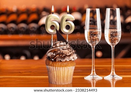 Cupcake With Number For Celebration Of Birthday Or Anniversary; Number 66.