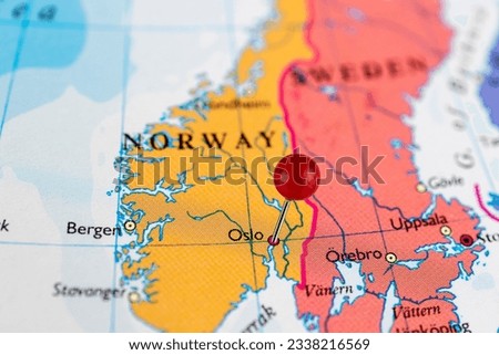 Oslo map. Close up of Oslo map with red pin. Map with red pin point of Oslo in Norway. Royalty-Free Stock Photo #2338216569