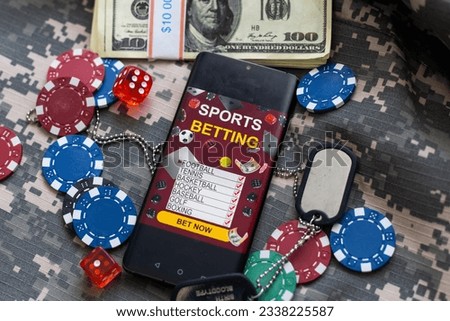 Gold inscription Sports Betting on a smartphone on the background of the stadium. Bets, sports betting, bookmaker. Mixed media.