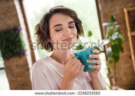 Harmony delight daydream photo relaxed young lady pleased drinking favorite cacao every day good morning in office workplace background Royalty-Free Stock Photo #2338233583