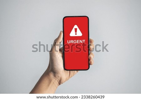 Man got urgent alert. emergency and urgent from working calling. Royalty-Free Stock Photo #2338260439