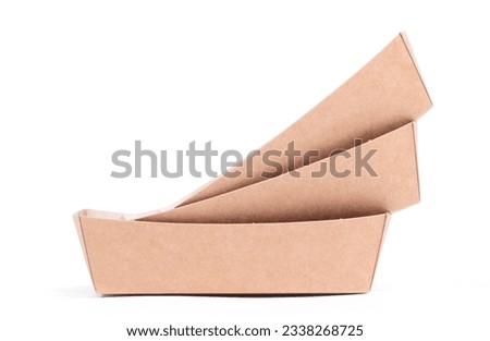 Empty disposable paper fast food tray isolated on a white background