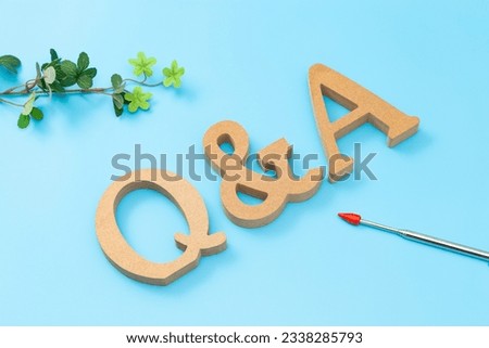 Q and A objects on blue background.
