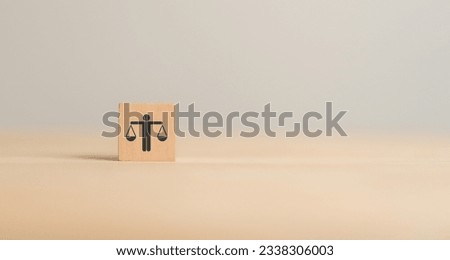 Business ethics concept. Business moral principles concept. Wooden cube blocks with "ETHICS" symbol on grey background and copy space. Banner for business integrity, good governance policy. Royalty-Free Stock Photo #2338306003