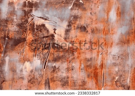 Rust metal texture old paint with scratches and marks on the iron wall, to me resembling angels flying, abstract background