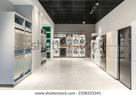 Interior of premium home appliance store in a mall Royalty-Free Stock Photo #2338333341