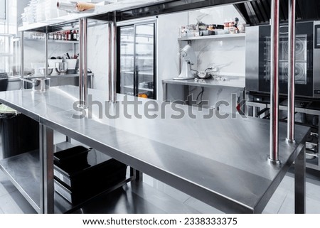Kitchen appliances in professional kitchen in a restaurant Royalty-Free Stock Photo #2338333375