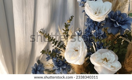 Artificial flowers Used to decorate in various ceremonies to make it beautiful. Royalty-Free Stock Photo #2338340311