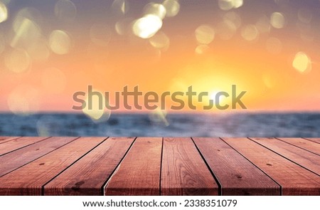 Table wooden top with blurred summer beach